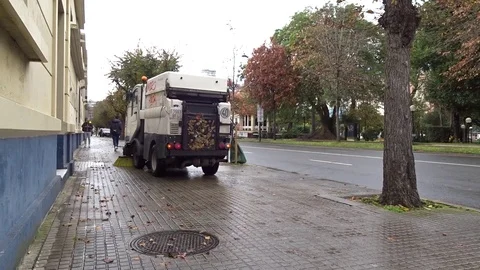 Street sweeper clearing streets in Coruna Spain Stock Footage 120180580