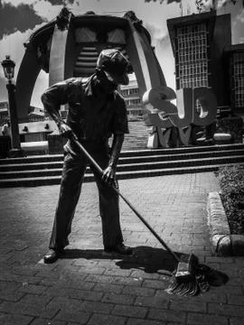 The Street Sweeper Statue. Stock Photos