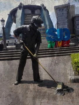 The Street Sweeper Statue. Stock Photos