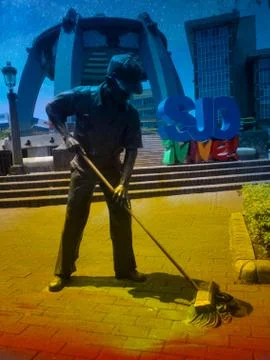 The Street Sweeper Statue. Stock Photos