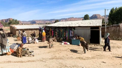 Street tailor working outside during markey day, tc01, Ethiopia December 2019 Stock Footage 102224075