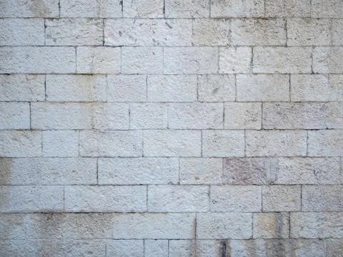 Street texture of painted rectangular stones wall Stock Photos