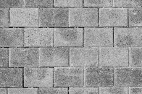 Street tile texture background. A pattern of gray paving slabs Stock Photos