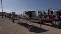 Street trader and lighthouse at Portugal southern tourism spot Sagres 4k or 4k+ Resolution