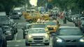 Street traffic on Manhattan New York City, cars, bicycles and pedestrians 4k or 4k+ Resolution