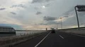 Street traffic scenery pov driving Bali highway over sea landscape 4k or 4k+ Resolution