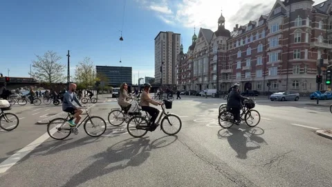 Street traffic view with cyclists at bicycle crossing in Copenhagen, Denmark Stock Footage 340958028