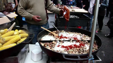 Street Vendor Adding Spices Stock Footage 23046850