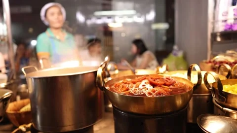 Street Vendor Preparing Assorted Beans in Syrup at Night Market Stock Footage 317144388