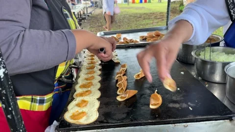Street Vendor Preparing Filled Mini Pancakes Stock Footage 326274928