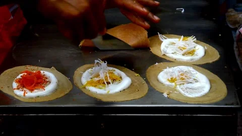 Street Vendor Preparing Thai Crispy Crepes Stock Footage 336229601