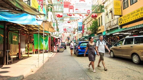 Street Vendor Shows Tourist Toy Helicopter in Trade District Stock Footage