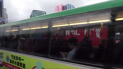 Street View from Bus Window, Bus Stop, Skyscrapers, Kowloon, Hong Kong Stock Footage 344408832