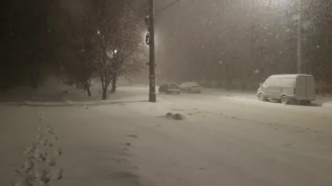 Street view front backyard of the building snowfall Stock Footage 256989885