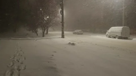 Street view front backyard of the building snowfall Stock Footage 256989912