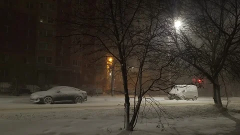 Street view front backyard of the building snowfall Stock Footage 256990783