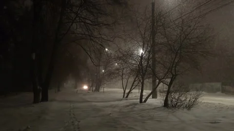 Street view front backyard of the building snowfall Stock Footage 256990875