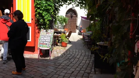 Street view with gate tower in the old town of Tallinn, Estonia Stock Footage 126573688