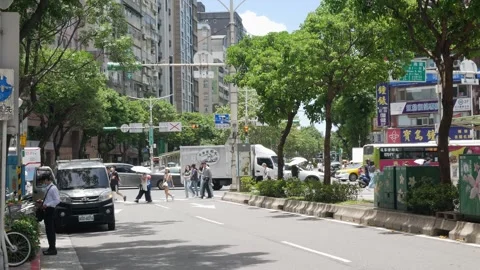 Street view at intersection with pedestrian and cars traffic transportation.. Stock Footage 256118789