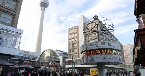 Street view of the large public square Alexanderplatz with Urania World Clock Stock Footage 240766554