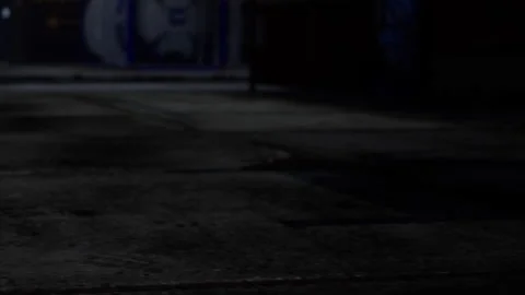 Street view at night with urban elements and shadows present Video stock 344966089
