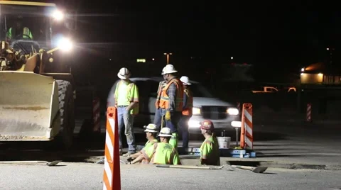 Street workers at night Stock Footage 53564293