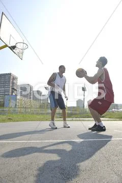 Streetball Game At Early Morning