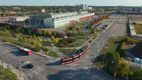 A streetcar pulls out of a maintenance facility to begin service Stock Footage 318377100