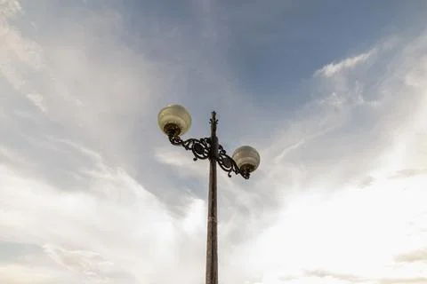Streetlight and clouds Stock Photos