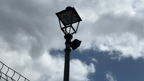 Streetlight and clouds shot with iphone 15 in a short timelapse Stock Footage 285559547