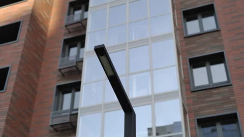 Streetlights cast glow ensuring environment for staying on street Vídeo Stock 264776396