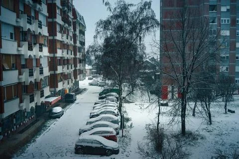 The streets of the city of Cacak while the first snow falls Stock Photos