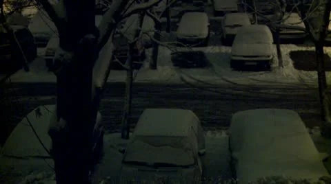 Streets covered with snow during the night, parking 5 Stock Footage 10735082