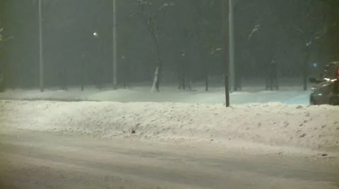 Streets covered with snow during the night, traffic Stock Footage 10820241