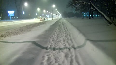 Streets covered with snow during the night, walking path 10 Stock Footage 10820497