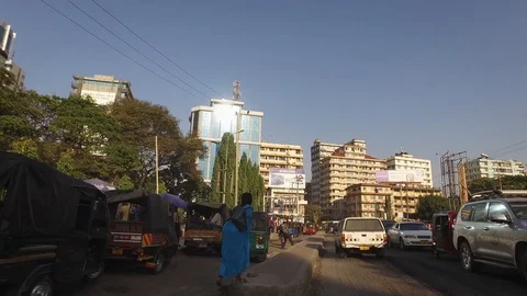 Streets of Dar Es Salaam, a crowd of people and busy traffic On Tanzania Stock Footage 119154722