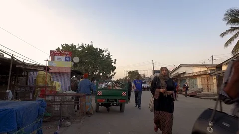 Streets of Dar Es Salaam, a crowd of people and busy traffic On Tanzania Stock Footage 119155991