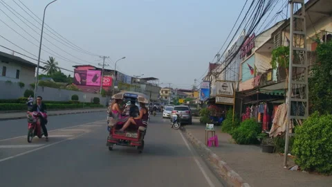 The streets of Vientiane, Laos, taken from a moving car Vídeo Stock 133946341