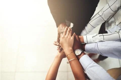 Strength is derived from unity. Closeup shot of a group of businesspeople Stock Photos