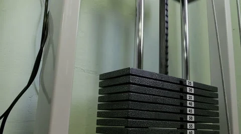 Strength training in the gym on simulators Stock Footage 62366377