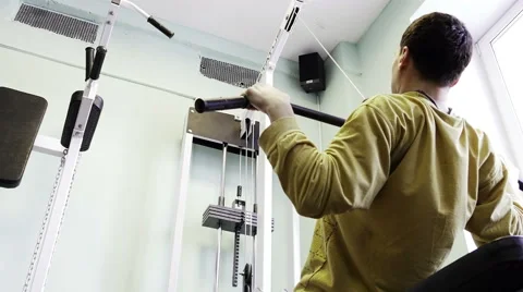 Strength training in the gym on simulators Stock Footage 62366533