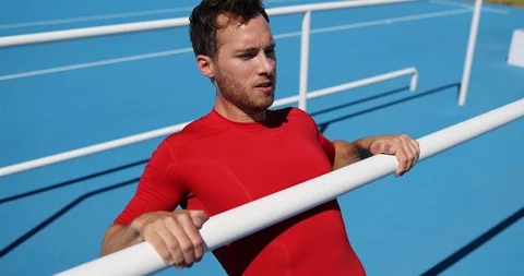 Strength training Pull-up exercise - fitness man working out in outdoor gym 스톡 동영상 124670643