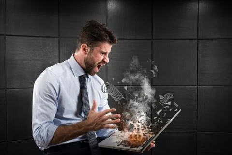 Stress and frustration caused by a computer Stock Photos