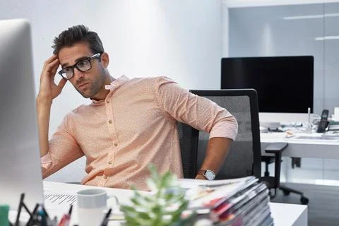 Stress, computer and man in office with worry for coding error, software an.. 库存照片