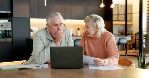 Stress, debt and old couple with laptop in home for mortgage, tax expenses or Stock Footage 337045241