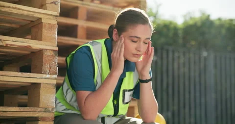 Stress, engineer and person at construction site with headache, frustrated and Stock Footage 271103898