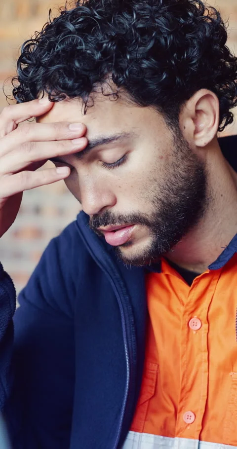 Stress, man and construction worker with headache on site for deadline on Stock Footage 337021672