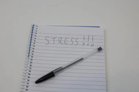 STRESS on Notepad Stock Photos