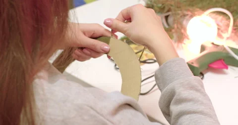 Stress relaxation manual work table routine work. She makes blank toy hands. Stock Footage 239467049