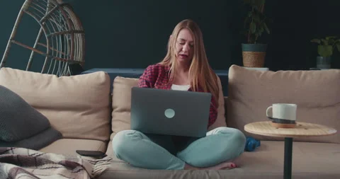 Stress from remote work. Beautiful serious focused young Caucasian freelancer Stock Footage 148401197